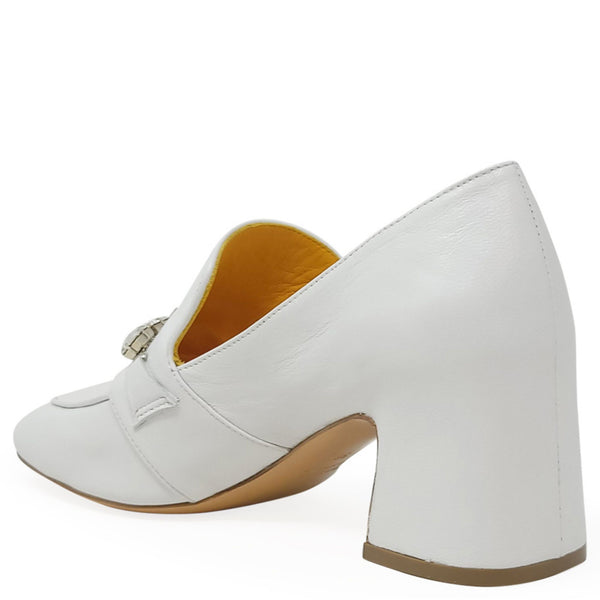 White shoe with a block heel on a white background