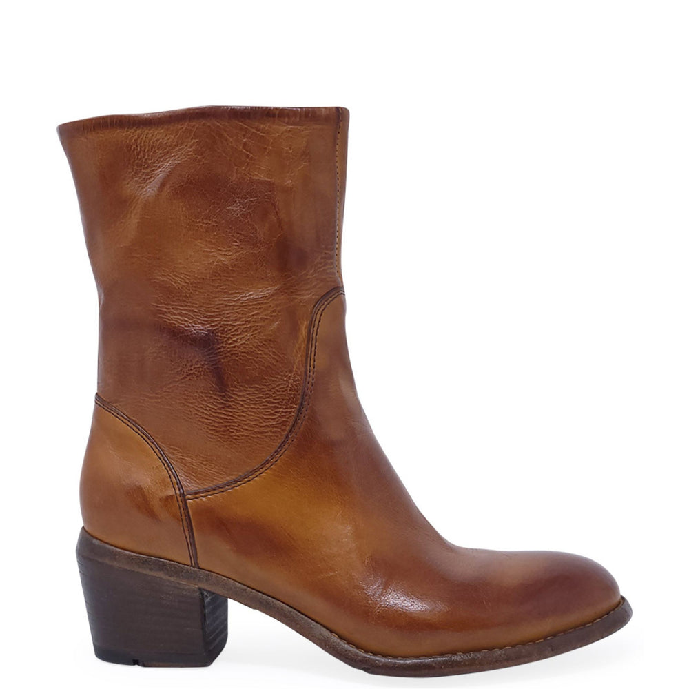 Brown leather boot on a white background