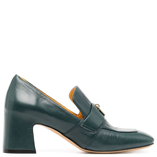 Green leather loafer shoe on a white background