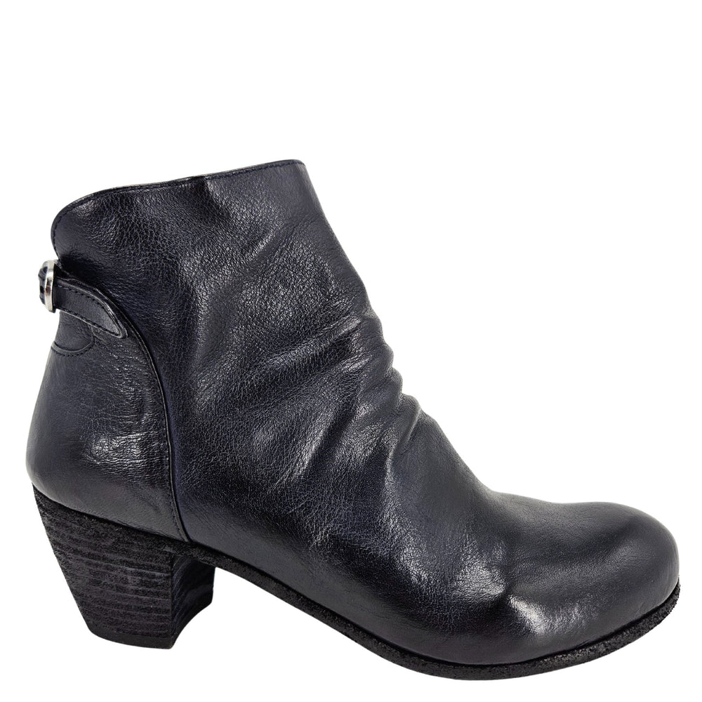 Black leather ankle boot on a white background