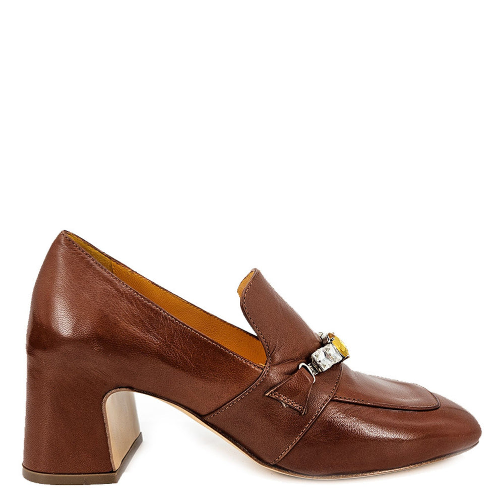 Brown leather shoe with a decorative buckle on a white background