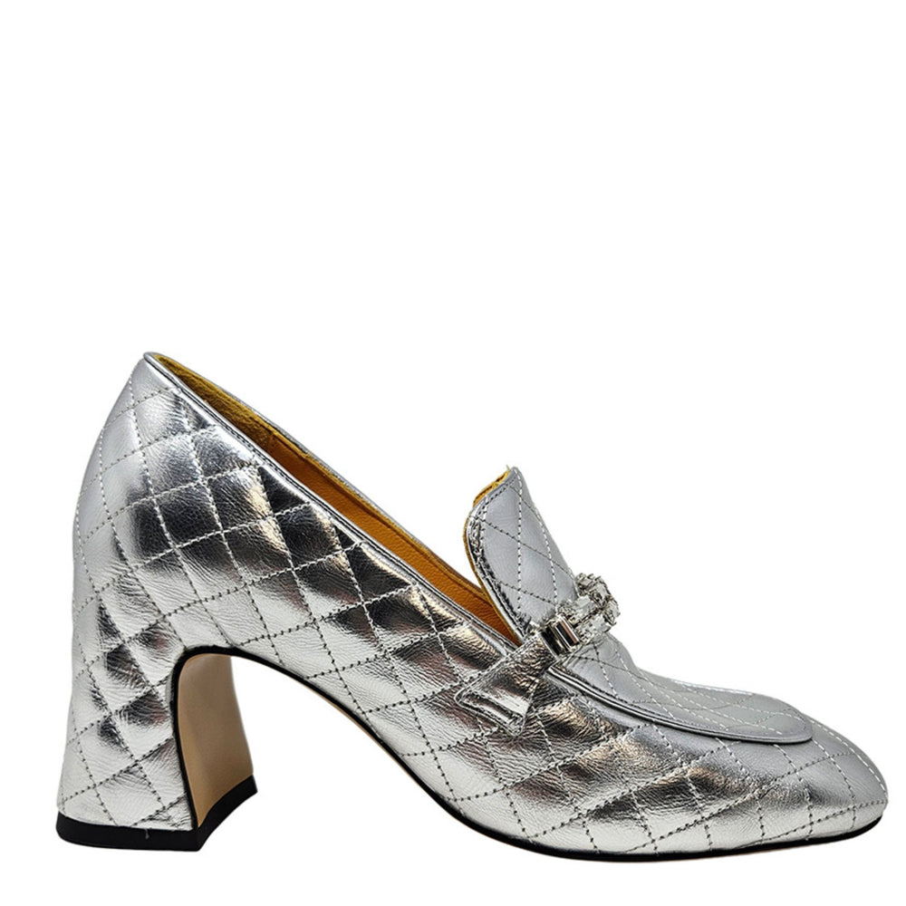 Silver quilted high-heeled shoe on a white background