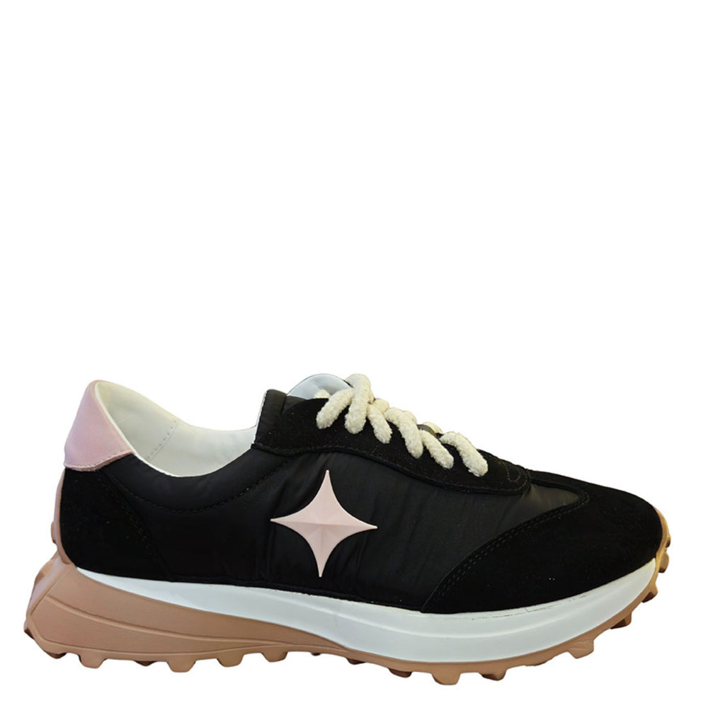 Black sneaker with a pink star design on a white background