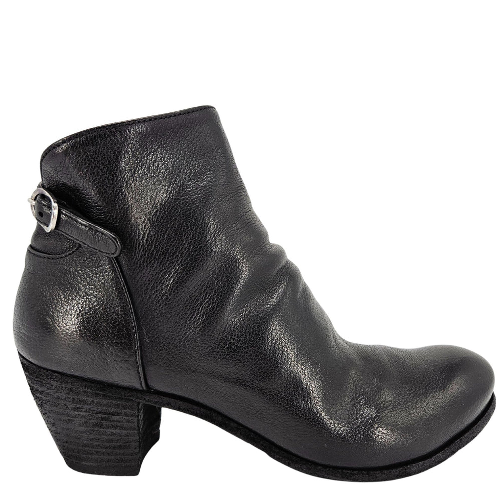 Black leather ankle boot on a white background