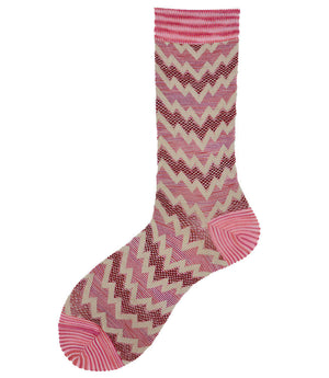 A mid-calf knit sock featuring a mix of textured panels, ribbed leg section, and bold horizontal stripes around the arch and cuff.
