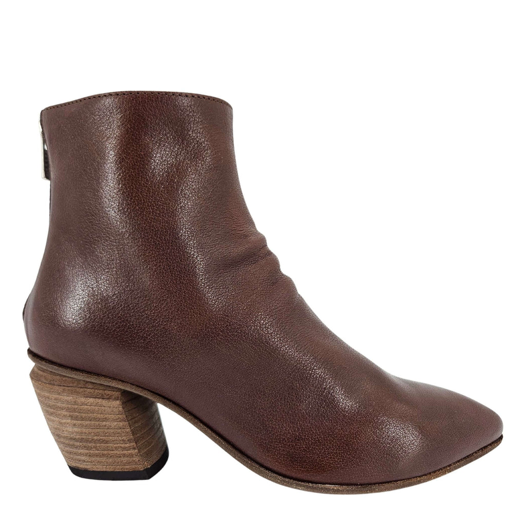 Brown leather Severine ankle boot with a stacked heel and back zipper, handcrafted by Officine Creative.
