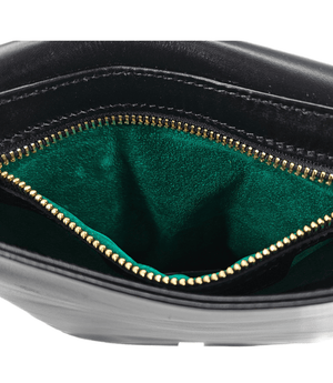 Luxury leather handbags, 100% handmade in Italy, featuring a signature center lock and elegant designs by Madison of Beverly Hills - Black Woven Leather White Crossbody Bag - Top View with Bag Open