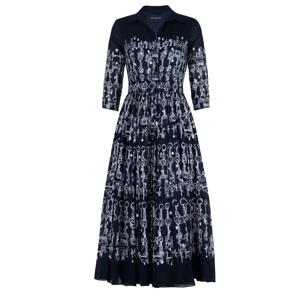 A solid black midi dress with a shirt collar, 3/4 sleeves, a button-front, and a pleated A-line skirt. A wide black belt with a large square buckle cinches the waist.