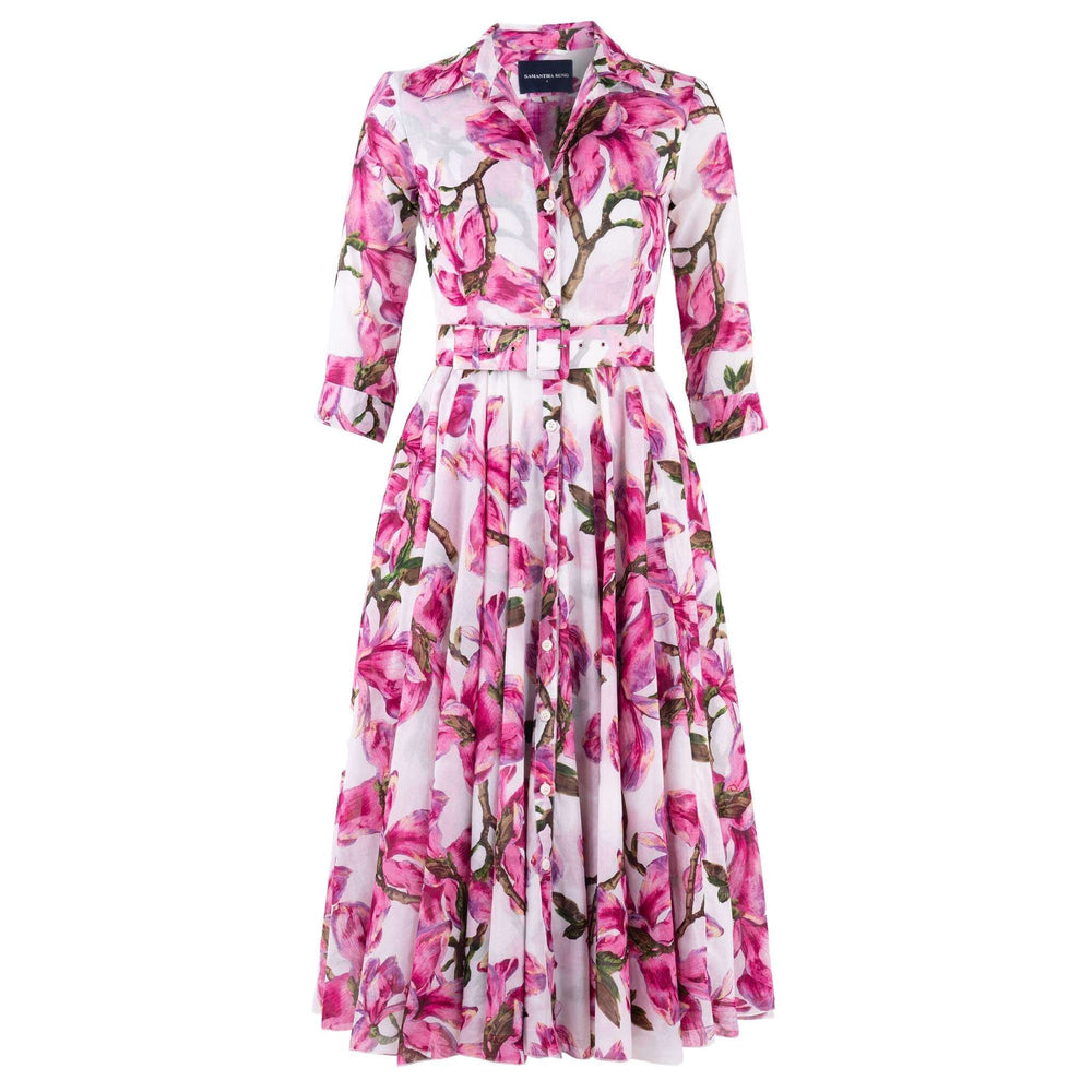 Here are the product descriptions and alt text for each of the three images you provided:
Image 1: Pink Magnolia Blossom Aster Dress (Back View)
Product Description:
Samantha Sung Aster Dress - Pink Magnolia Blossom Print Cotton Musola Midi
Capture the essence of a blossoming garden with the exquisite Samantha Sung Aster Dress, featuring the captivating "Pink Magnolia Blossom" print. Showcased here from the back, this midi dress reveals a vibrant array of lush pink magnolias and delicate branches against