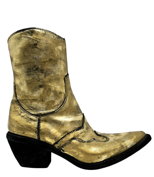 Mid-calf western-style boot featuring a distressed gold metallic finish, pointed toe, angled block heel, and contrast stitching. Designed with decorative panel overlays and a side zipper closure - side view