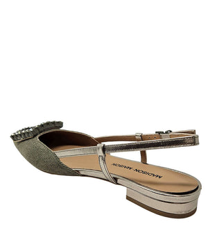 Pointed-toe slingback flat with low heel, adjustable ankle strap, and large decorative jewel embellishment on the toe. Features mixed material textures and an open heel design.