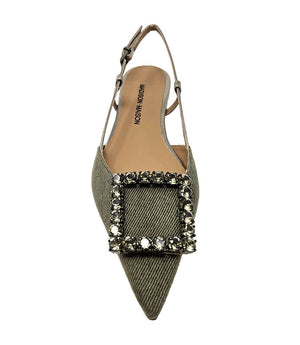 Pointed-toe slingback flat with low heel, adjustable ankle strap, and large decorative jewel embellishment on the toe. Features mixed material textures and an open heel design.