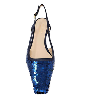 Handcrafted slingback shoe with sequin embellishments, low heel, and pointed toe design. Features an adjustable ankle strap and a textured surface for added visual interest