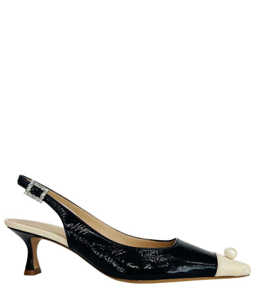 "Elegant Italian-made slingback heel with a low tapered heel, square toe, and a pearl accent on the toe cap. Features a textured finish and jeweled buckle strap. Shown from multiple angles against a clean background.