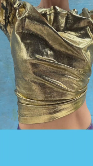 Short-sleeve crew neck T-shirt made from a soft, stretch-finish fabric with a subtle sheen. Features a fitted silhouette with clean stitching and minimal seams.