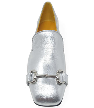 leather loafer with a rounded toe and flat sole, featuring a metal horsebit-style detail across the front. Designed by Madison in Beverly Hills and handcrafted in Italy.