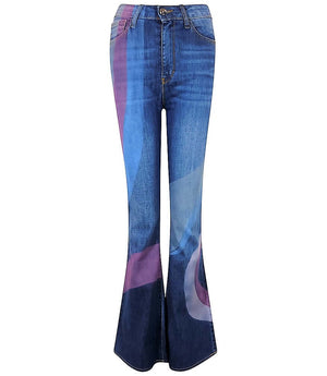 Women's high-rise flared jeans made in Italy from premium stretch denim, featuring abstract panel detailing on the legs and a tailored fit through the hip and thigh for a flattering silhouette.