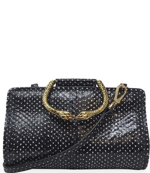 Structured mini handbag crafted from textured leather with a dotted pattern, featuring a sculptural metal snake-shaped top handle with dual serpent heads. Includes a detachable adjustable leather strap with metal clasps for versatile wear as a crossbody o