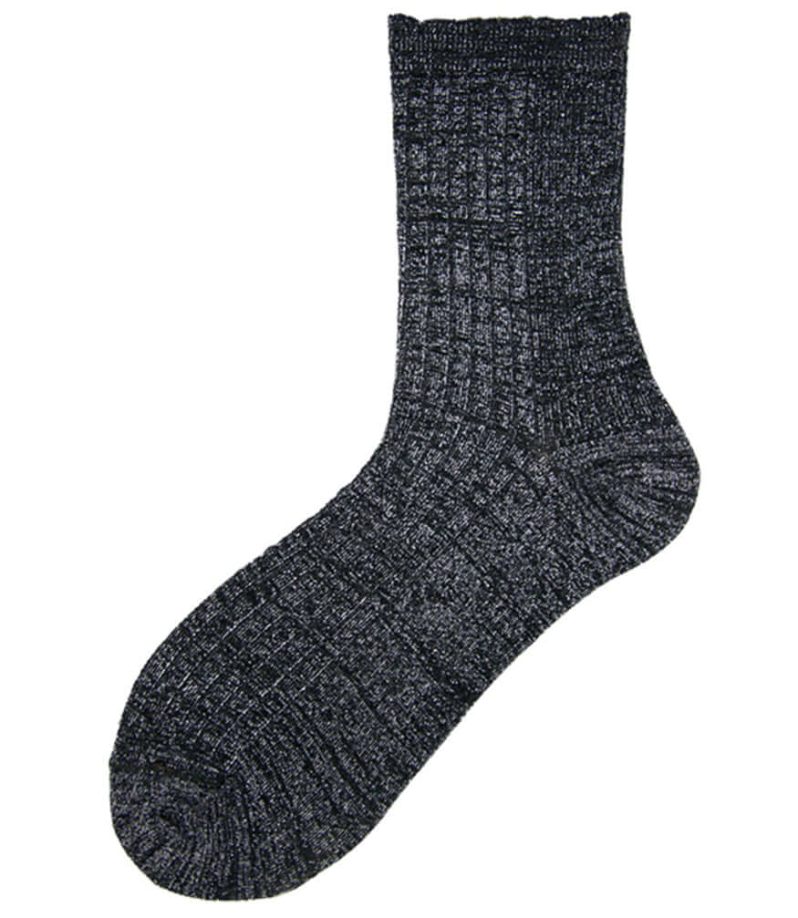 A mid-calf knit sock featuring a mix of textured panels, ribbed leg section, and bold horizontal stripes around the arch and cuff.