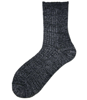 A mid-calf knit sock featuring a mix of textured panels, ribbed leg section, and bold horizontal stripes around the arch and cuff.