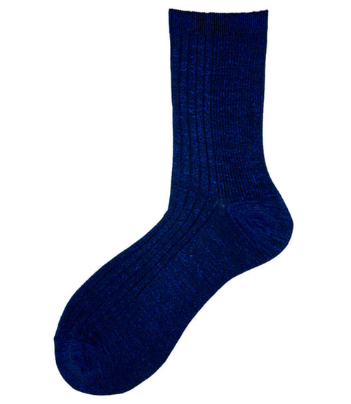 A mid-calf knit sock featuring a mix of textured panels, ribbed leg section, and bold horizontal stripes around the arch and cuff.