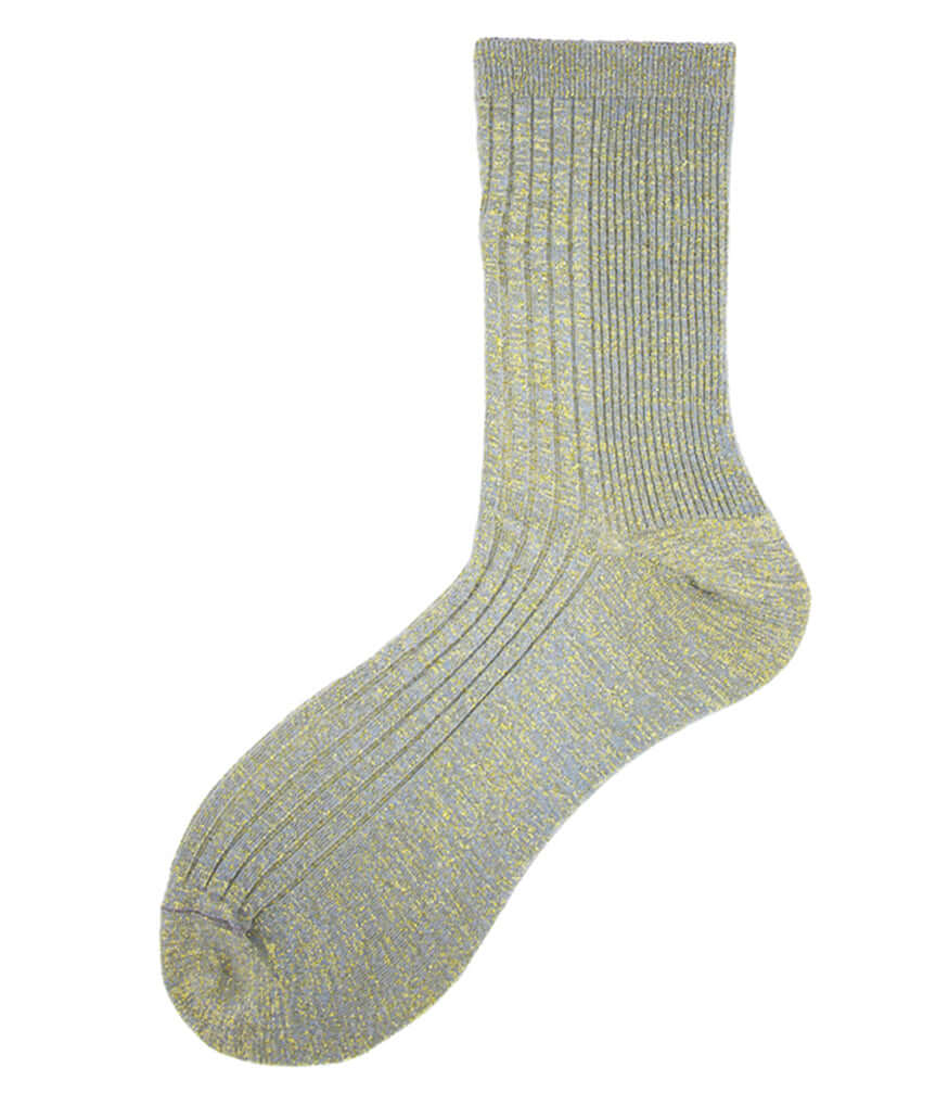 A mid-calf knit sock featuring a mix of textured panels, ribbed leg section, and bold horizontal stripes around the arch and cuff.