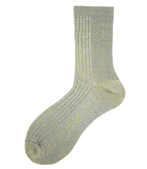 A mid-calf knit sock featuring a mix of textured panels, ribbed leg section, and bold horizontal stripes around the arch and cuff.