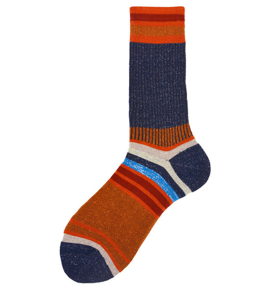 A mid-calf knit sock featuring a mix of textured panels, ribbed leg section, and bold horizontal stripes around the arch and cuff.