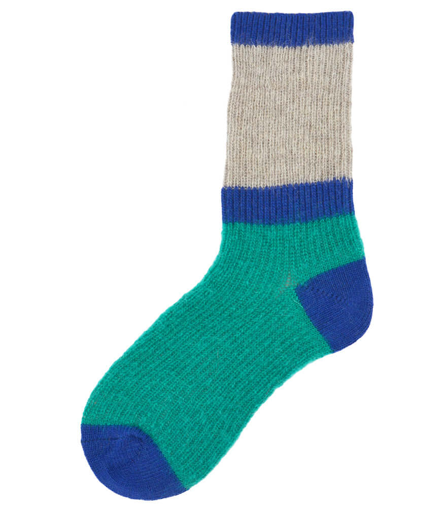 A mid-calf knit sock featuring a mix of textured panels, ribbed leg section, and bold horizontal stripes around the arch and cuff.