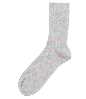 A mid-calf knit sock featuring a mix of textured panels, ribbed leg section, and bold horizontal stripes around the arch and cuff.