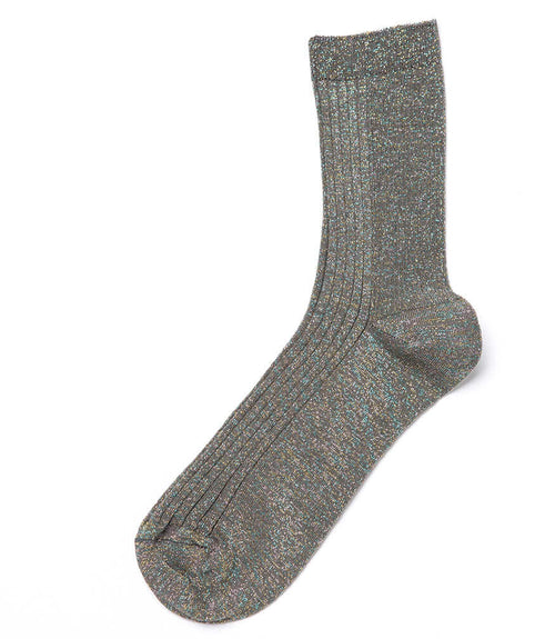 A mid-calf knit sock featuring a mix of textured panels, ribbed leg section, and bold horizontal stripes around the arch and cuff.