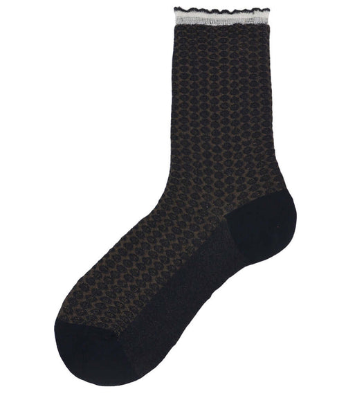 A mid-calf knit sock featuring a mix of textured panels, ribbed leg section, and bold horizontal stripes around the arch and cuff.