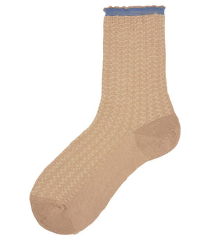 A mid-calf knit sock featuring a mix of textured panels, ribbed leg section, and bold horizontal stripes around the arch and cuff.