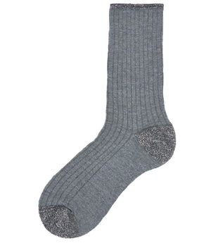 A mid-calf knit sock featuring a mix of textured panels, ribbed leg section, and bold horizontal stripes around the arch and cuff.