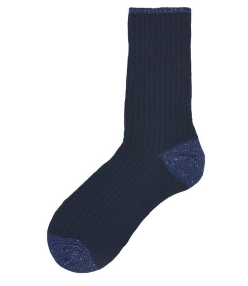 A mid-calf knit sock featuring a mix of textured panels, ribbed leg section, and bold horizontal stripes around the arch and cuff.