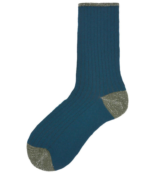 A mid-calf knit sock featuring a mix of textured panels, ribbed leg section, and bold horizontal stripes around the arch and cuff.