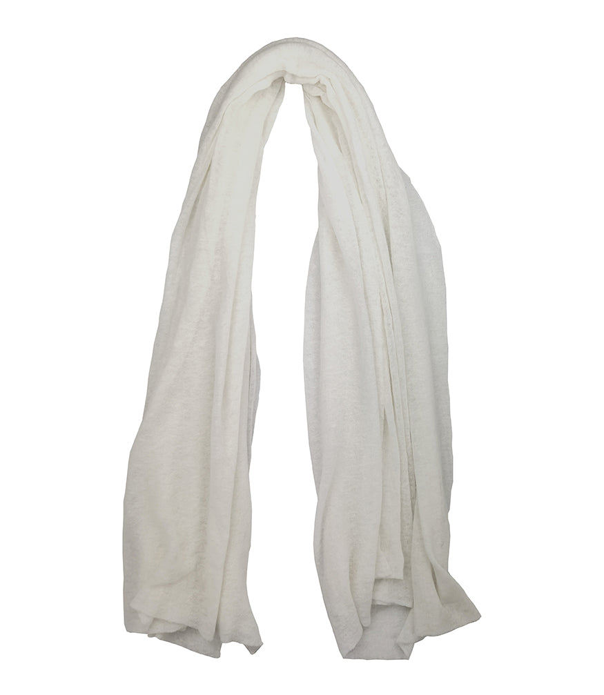 A lightweight, rectangular scarf with soft texture and raw edges, draped to show length and fluidity