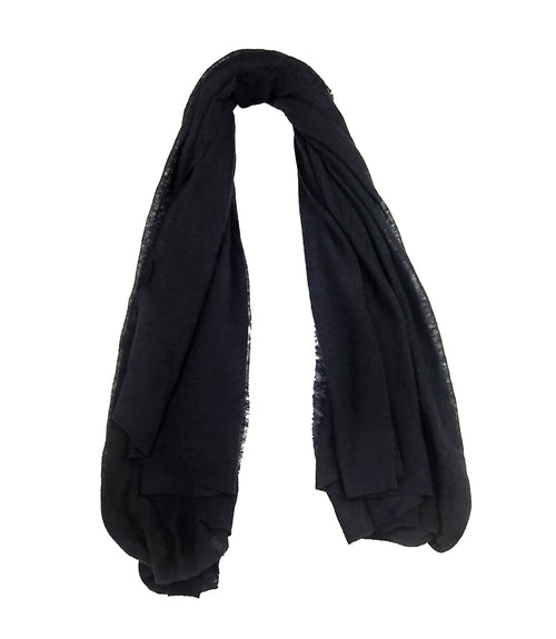 A lightweight, rectangular scarf with soft texture and raw edges, draped to show length and fluidity