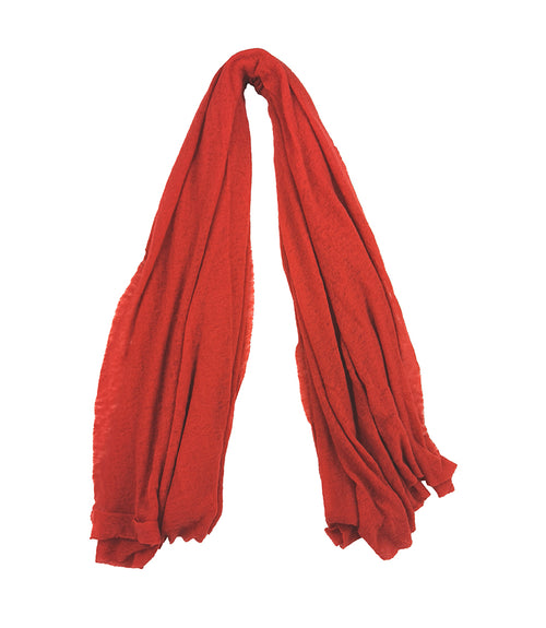 A lightweight, rectangular scarf with soft texture and raw edges, draped to show length and fluidity