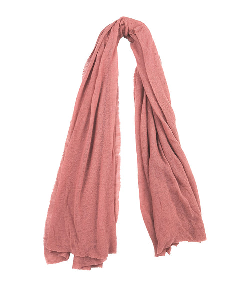 A lightweight, rectangular scarf with soft texture and raw edges, draped to show length and fluidity