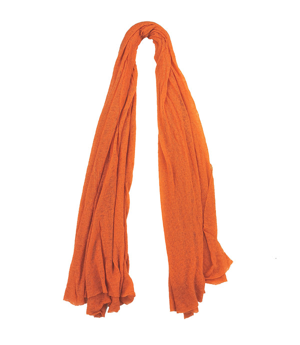 A lightweight, rectangular scarf with soft texture and raw edges, draped to show length and fluidity