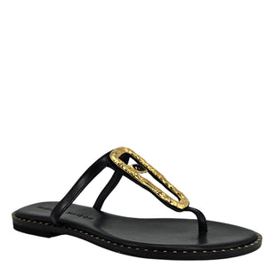 Black sandal with a gold buckle on a white background
