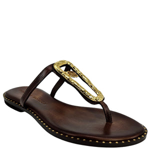 Brown sandal with gold embellishments on a white background