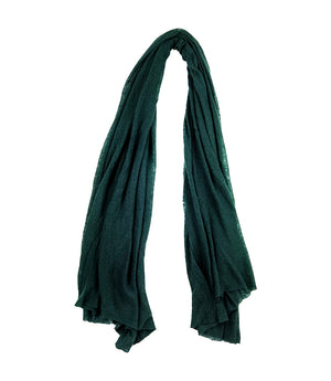 A lightweight, rectangular scarf with soft texture and raw edges, draped to show length and fluidity