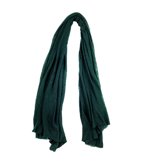 A lightweight, rectangular scarf with soft texture and raw edges, draped to show length and fluidity