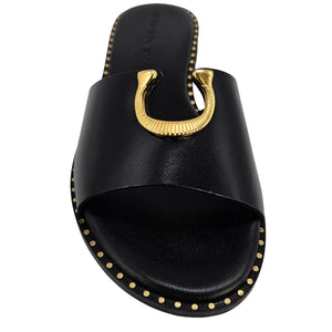 Black sandal with gold accents on a white background