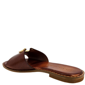 Brown sandal with wooden sole on a white background