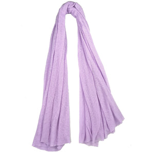 Lavender scarf draped over a white background