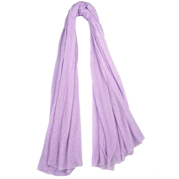 Lavender scarf draped over a white background
