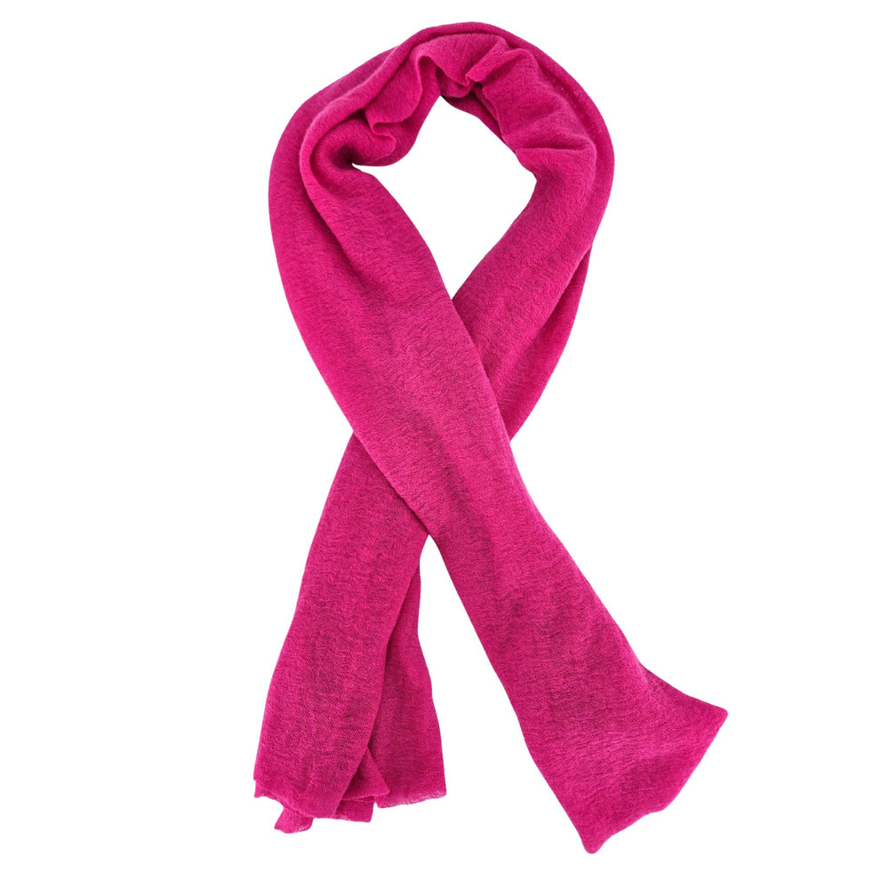 Folded Berry color Cashmere scarf on a white background